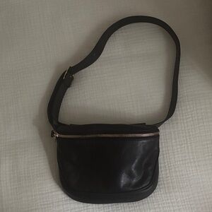 Chic Black Crossbody Bag with Gold Accents